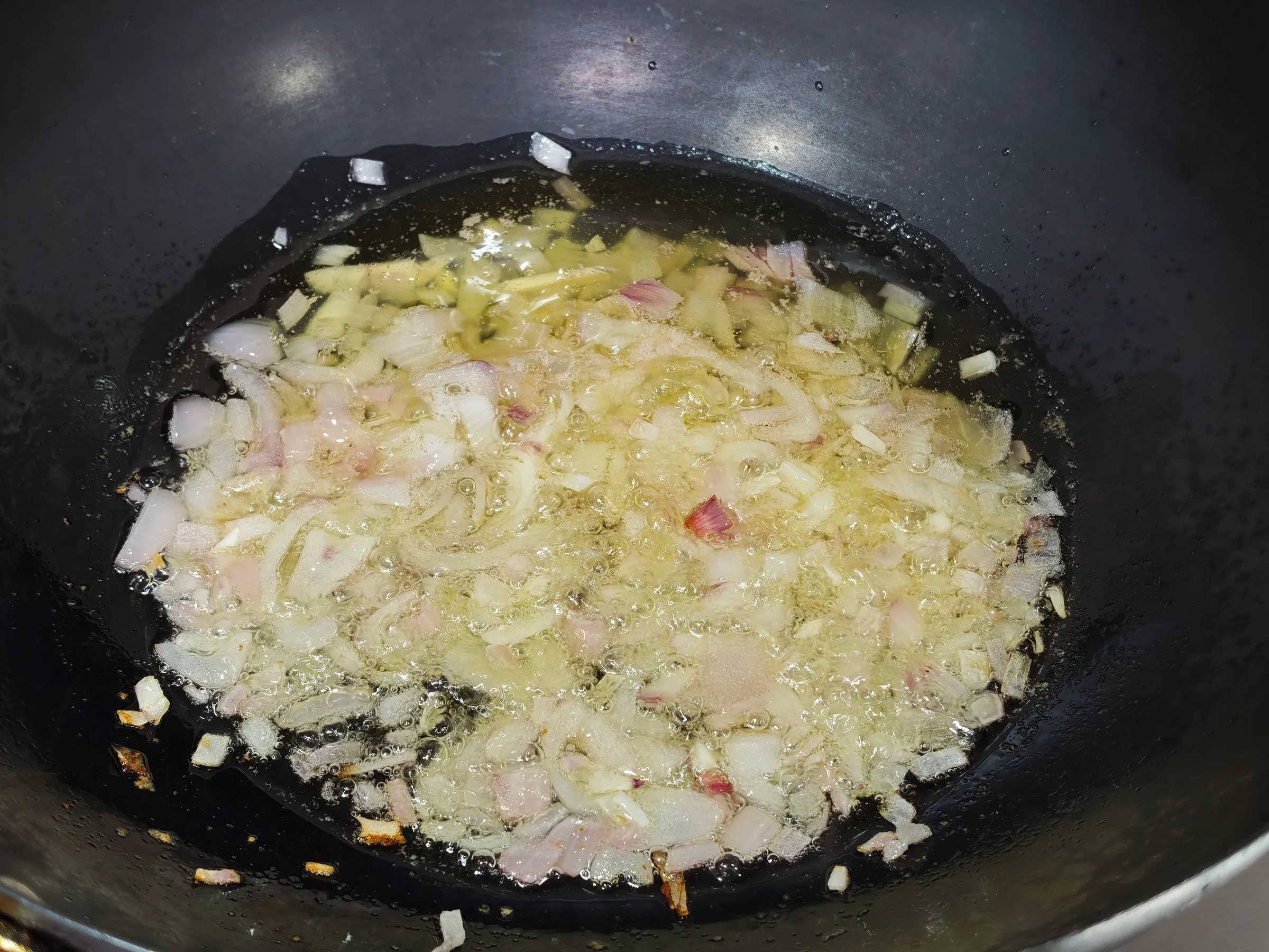 Frying the diced onion
