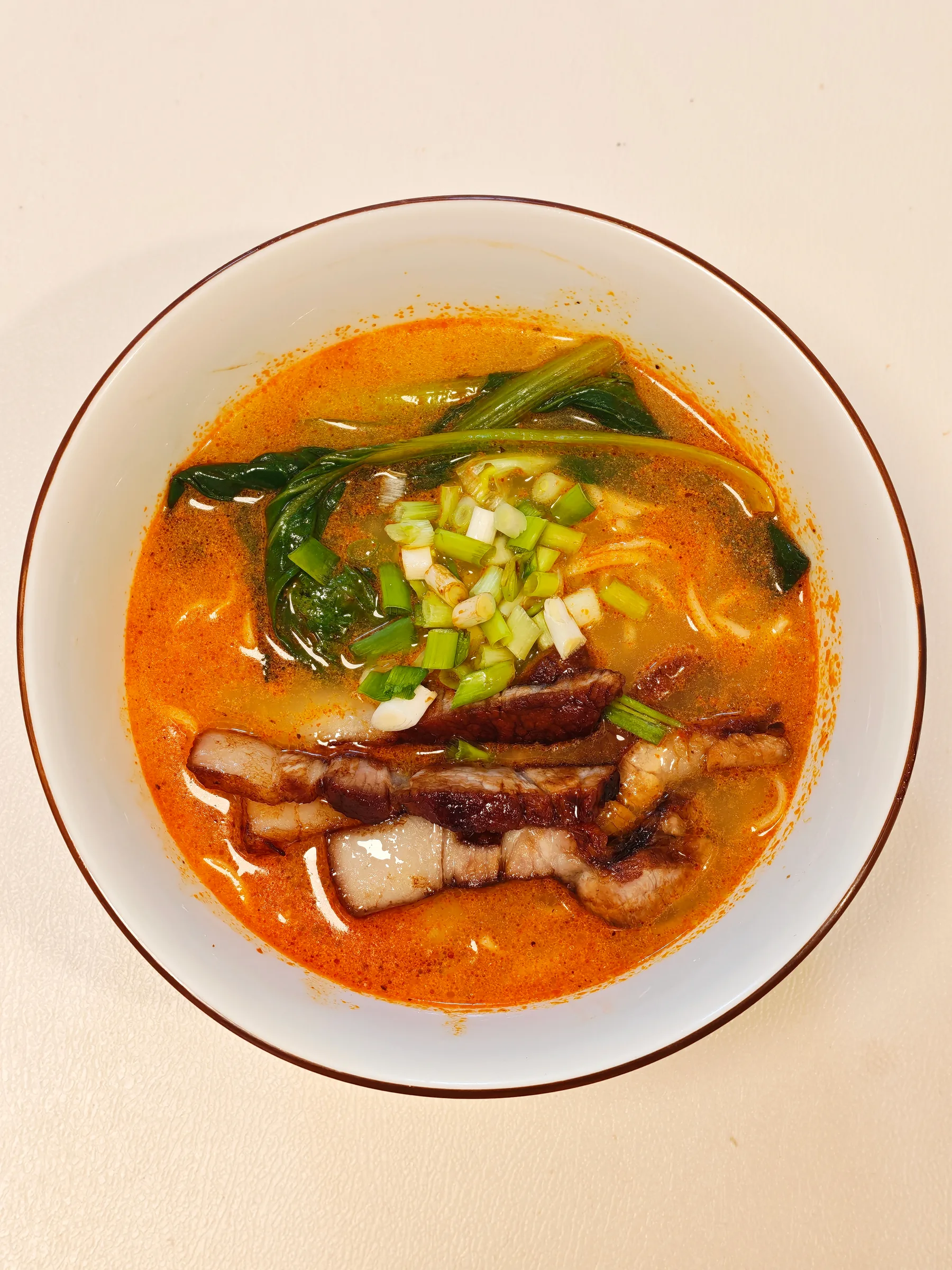 Served over noodles
