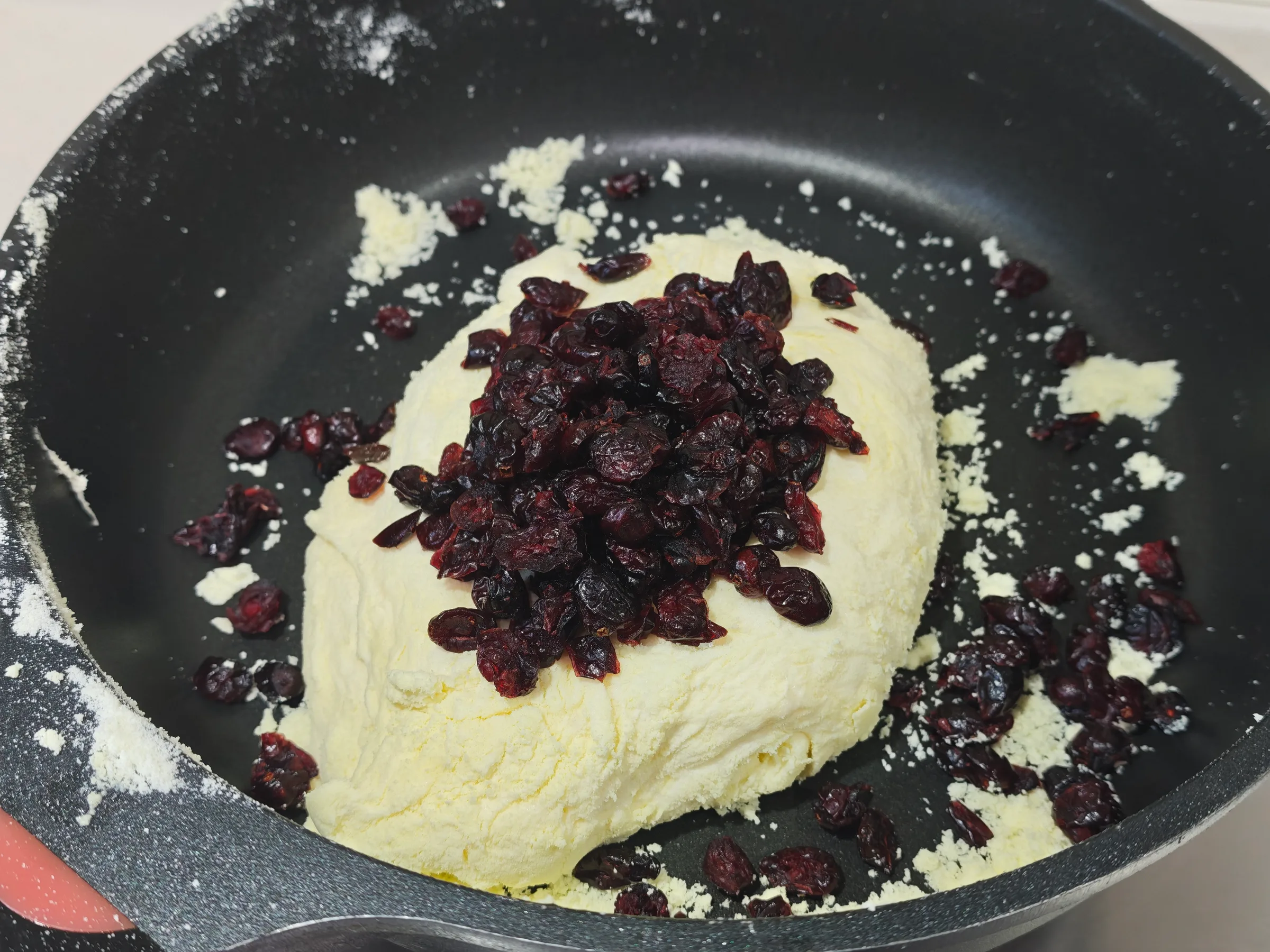 Mixing in the cranberries
