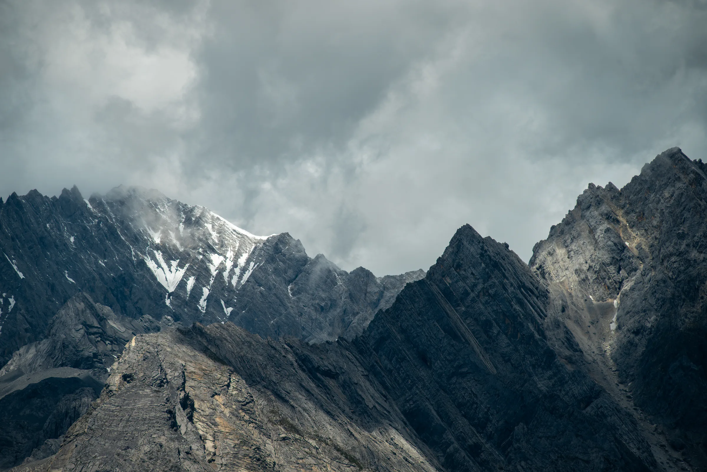 Jade Dragon Snow Mountain under heavy cloud